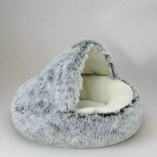 This plush Canopy Bed is designed to provide your pet with a perfect mix of comfort and security. With its soft, cushiony interior and built-in canopy, it offers a cozy retreat for your cat or small dog. The bed’s plush material creates a warm, inviting space, ideal for naps and relaxation. Perfect for kittens, small dogs, and cats, this stylish bed ensures your furry friend enjoys restful, peaceful sleep in a space they can call their own.